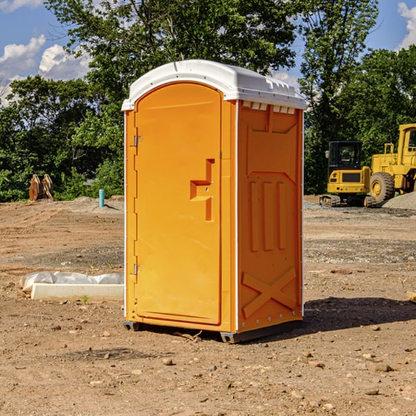 how often are the porta potties cleaned and serviced during a rental period in Grenelefe